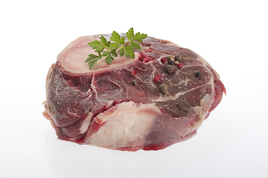 Raw shank with marrowbone and parsley