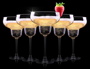 champagne glass on black background