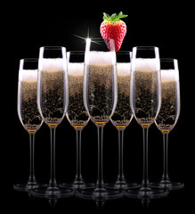 champagne glass on black background