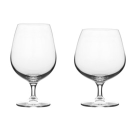 Glass of scotch whiskey and emty glass on a white background