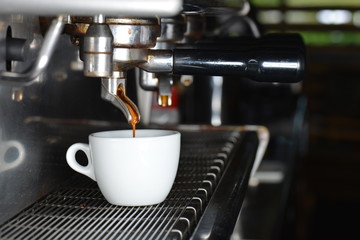 Espresso machine brewing a coffee