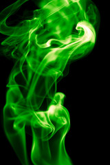 green smoke on black background
