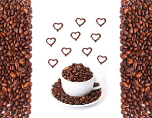 Coffee mug full of coffee beans with heart shapes