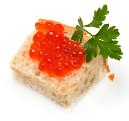 red caviar on bread with parsley