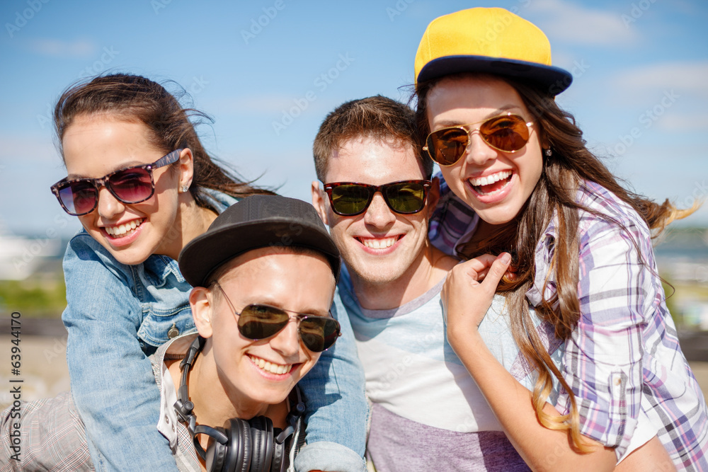 Wall mural group of smiling teenagers hanging out