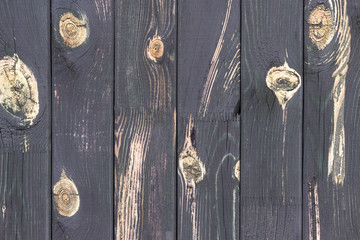 The old dark wood texture with natural patterns