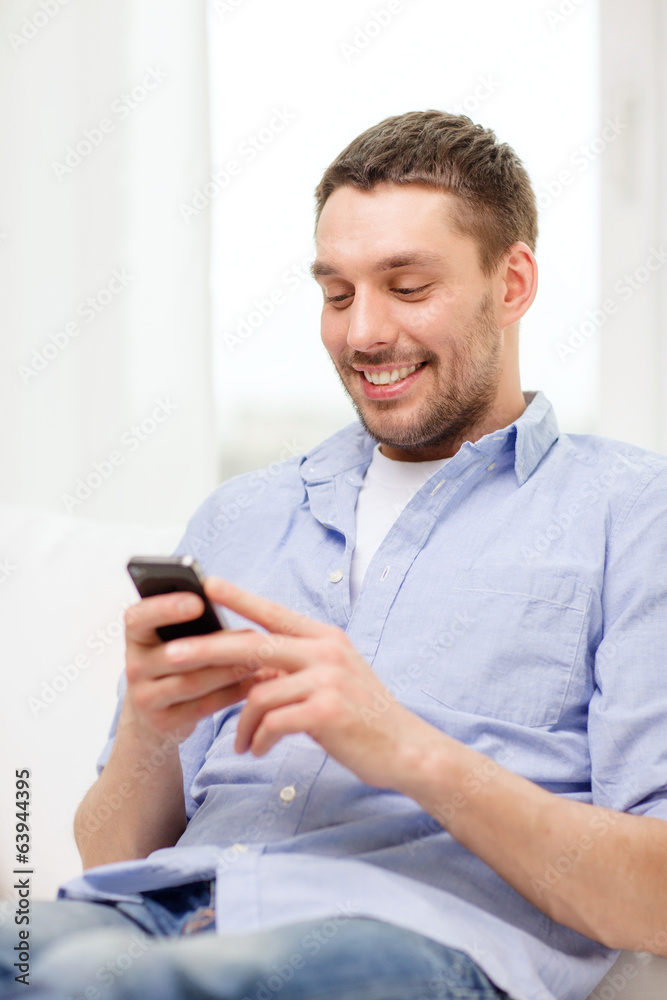 Sticker smiling man with smartphone at home