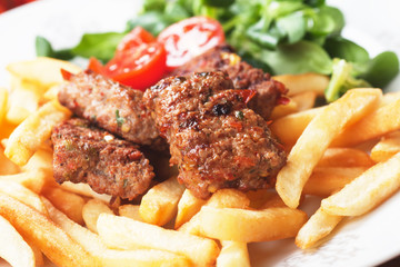 Square burgers with french fries