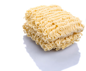 Dried instant noodles over white background