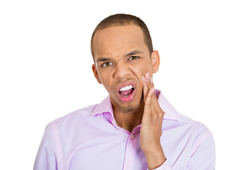 Toothache. Man has sensitive teeth