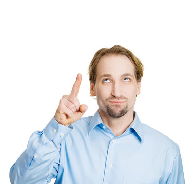 See above. Man pointing with finger looking up, blank copy space