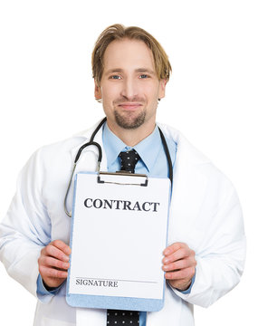 Male doctor with stethoscope holding contract sign