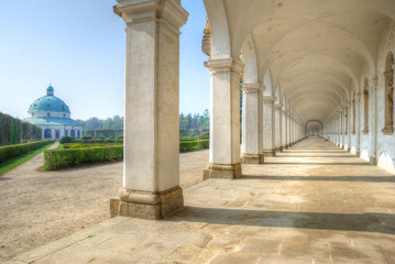 Fototapeta premium Long colonnade and baroque pavilion in city gardens