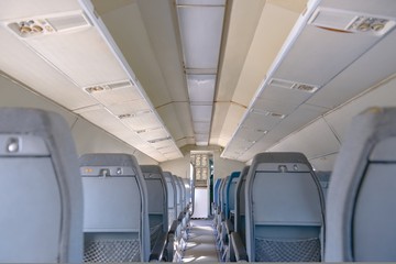 Obraz premium Interior of an airplane with many seats