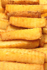 French fries for a fast food snack on a white background.