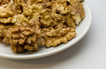 Nuts on white plate