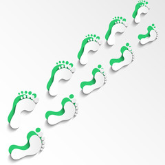 Abstract light background with prints of a human foot.