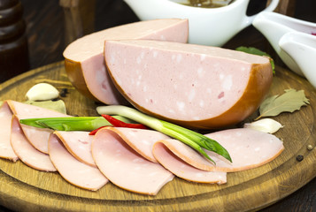 sausage on a wooden plate in a restaurant
