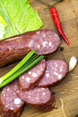 sausage on a wooden plate in a restaurant