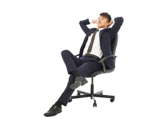 young businessman sitting on a chair and thinking