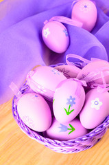 Easter decorative eggs in violet colours