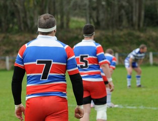 Fototapeta premium les hommes au rugby