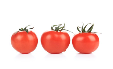 Three ripe tomatoes.