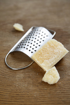Parmesan cheese with cheese grater