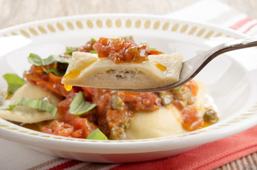 italian ravioli with soft cheese basil filling