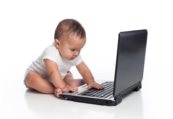Baby Boy Typing on a Laptop Computer