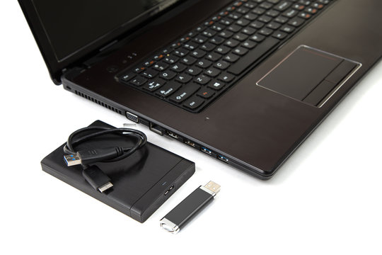 Laptop Computer And External USB Hard Drive And Memory Stick