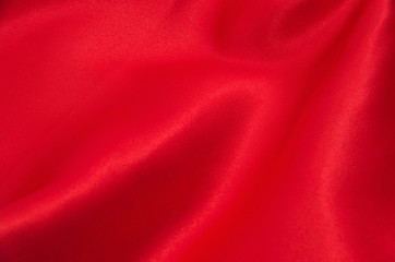red satin or silk fabric as background