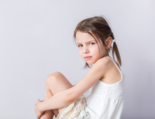 Portrait of angry preschooler girl in closed pose © azamyatina