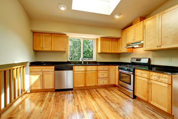 Spacious kitchen room with window in ceiling