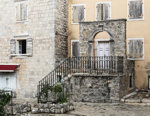 Mediterranean stone houses with window shutters