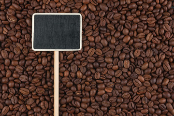 Pointer, the price tag lies on coffee  beans