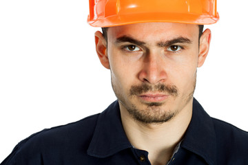 Funny worker in helmet with emotion on her face