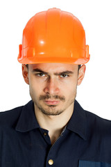 Funny worker in helmet with emotion on her face