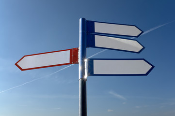Signpost with red and blue arrows