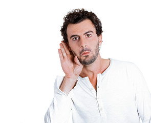 Portrait Curious man, hand to ear, listening to latest rumors