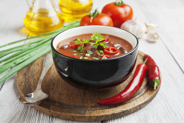 Chili soup with red beans and greens