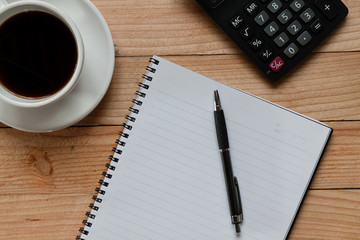 worktable covered with documents. Above view shot.