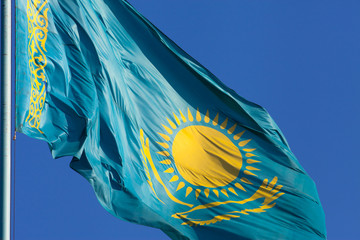 Kazakhstan flag on a blue background