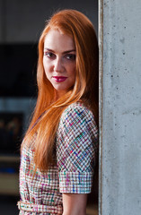 young beautiful woman in knitted dress