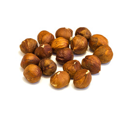 Heap of hazelnuts .
