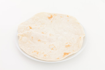 Single flat bread pita isolated on white background
