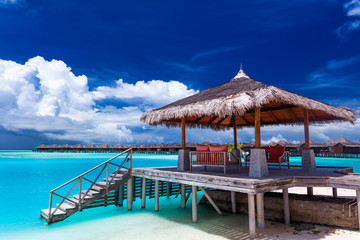 Boat jetty with steps on a tropical island of Maldives