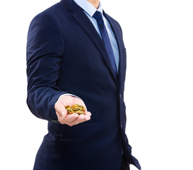 Businessman holding gold coin