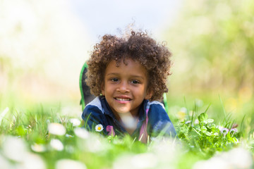 Cute african american little boy playing outdoor - Black people