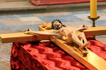 Wooden figure of Jesus crucified, in the church during Easter